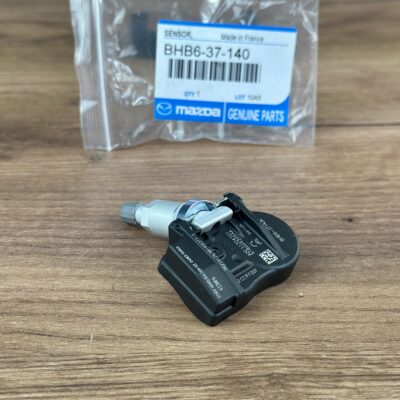 Датчик давления шин Mazda BHB637140